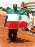 Sir Mesi holding the Equatorial flag of Guinea A end of a tournament 